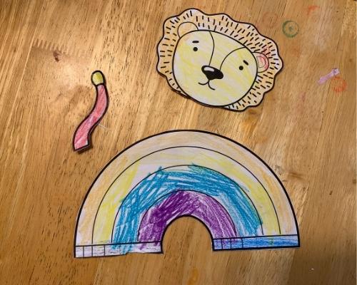 rainbow lion pieces on table