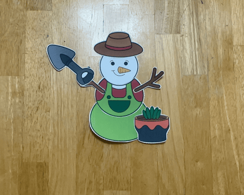 Snowman gardner on table