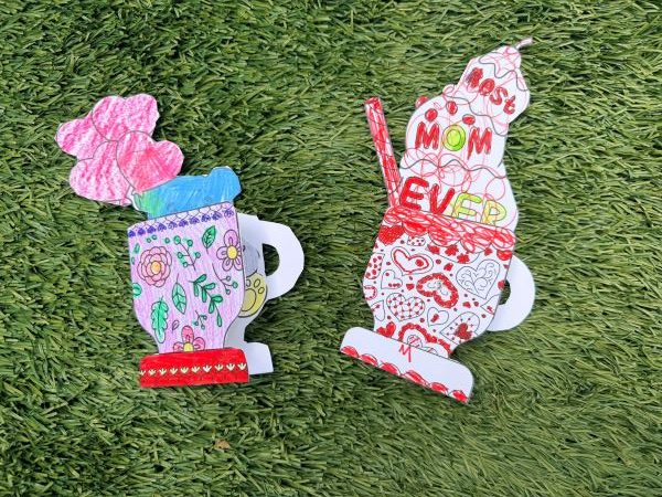2 diy mother's day cards on grass